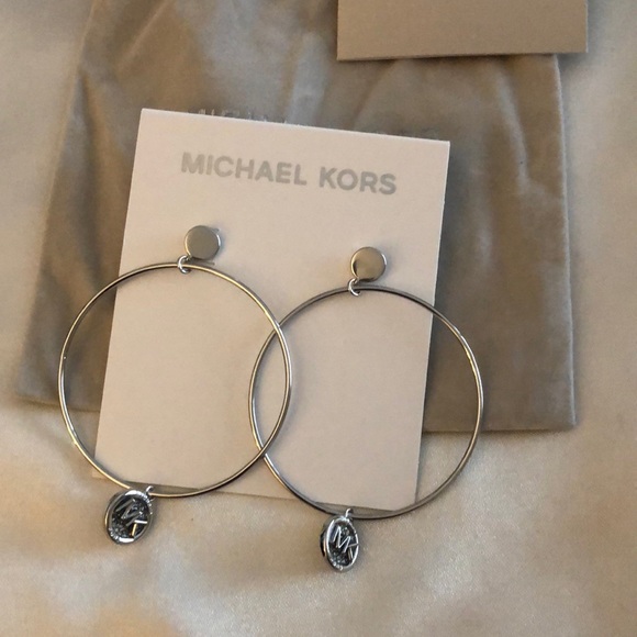Michael Kors Silver Tone Brass Hoop Earrings With Round MK Charm & Crystal NWT - Picture 1 of 13